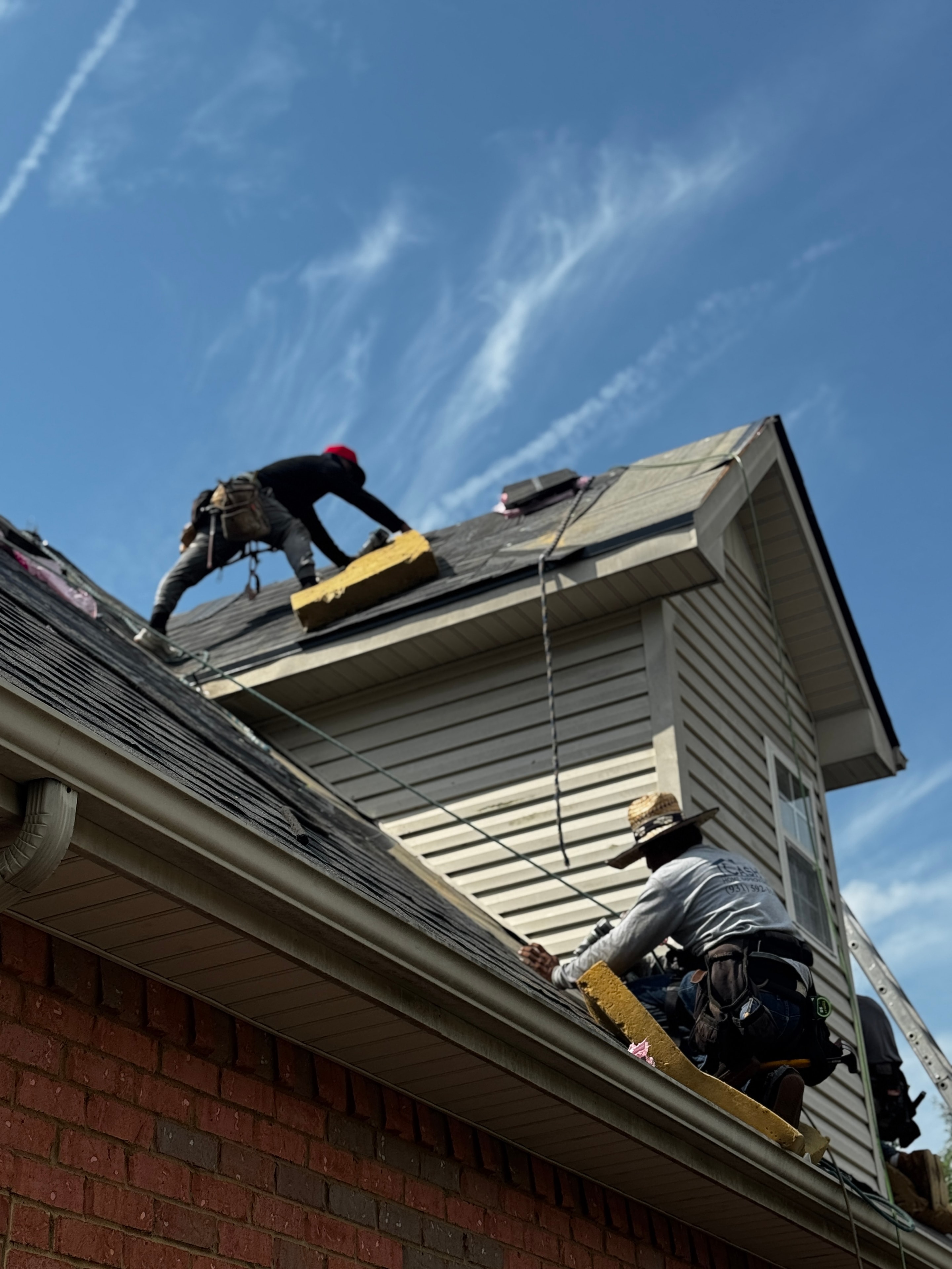 Roofing crew on the job